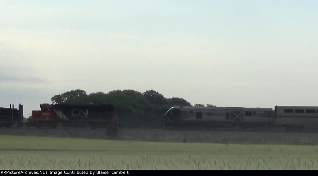 CN L588 meeting Amtrak 390